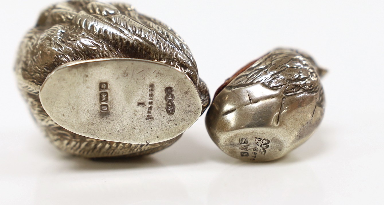 Two Edwardian silver mounted novelty pin cushions, modelled as hatching chicks, by Sampson Mordan & Co, Chester, 1906 & 1908, tallest 27mm, together with a similar novelty chick pepperette, same maker, Sheffield, 1906.